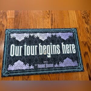 “Our Tour Begins Here” doormat
